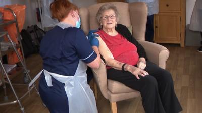 Care home resident receives Covid vaccine booster