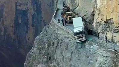 Truck on cliff edge