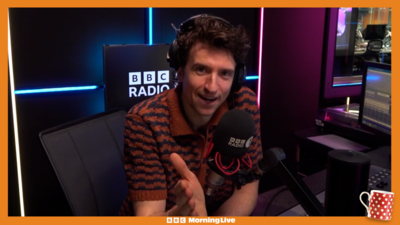 Greg James sits in his BBC Radio 1 studio to discuss his Comic Relief challenge with Greg and Helen on Morning Live