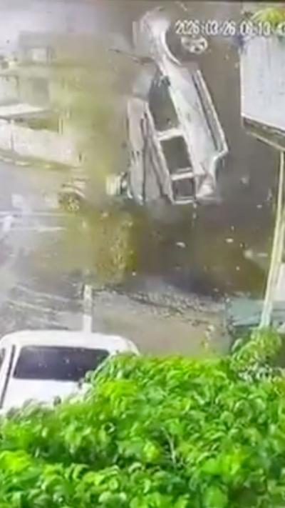 A car flying through the air during an explosion
