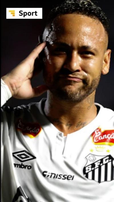 Neymar, wears the Santos home kit and holds his hand to his head as he celebrates after scoring his team's first goal against Red Bull Bragantino