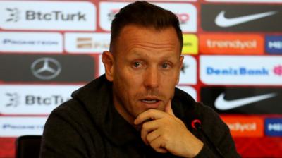 Craig Bellamy speaks to the media