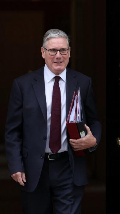 Keir Starmer leaves No 10 with a folder