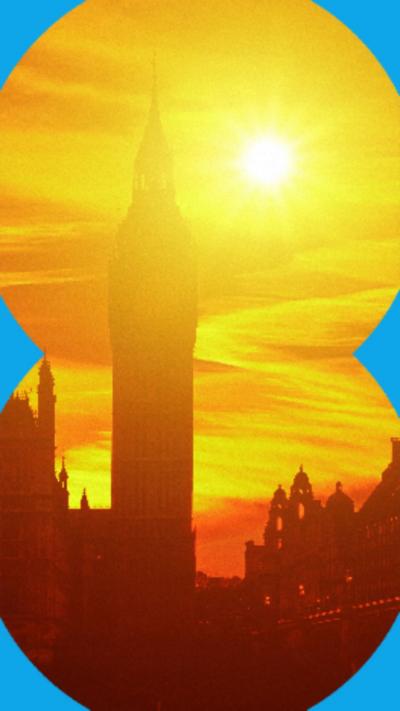 Silhouette os Big Ben with the sun in the background creating a deep orange sky.
