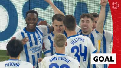 Brighton's Solly March celebrates with teammates