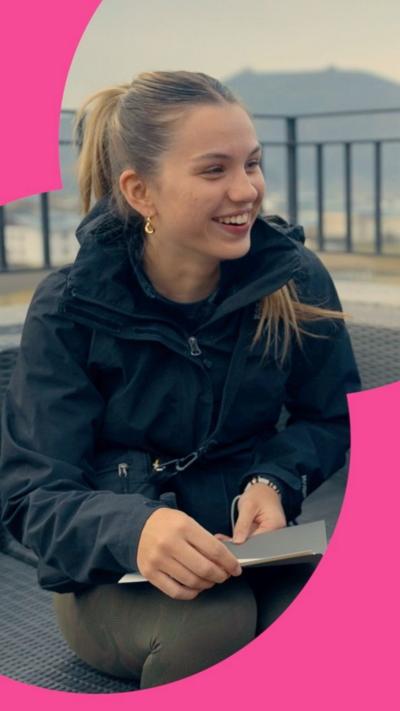 Contestant Sioned smiling, wearing a blue jacket 