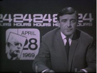 Newsreader sits in front of a background that says '24 Hours' and has that day's date,  April 28 1969, written on it