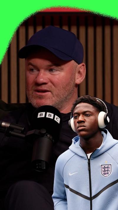 Wayne Rooney and Kobbie Mainoo