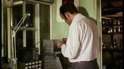 Gerald Wingrove working on one of his model cars.