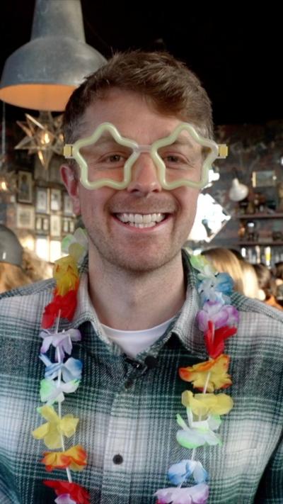 Aman in flower garlands