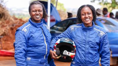 Caroline and Tinashe Gatimu shown in racing overalls