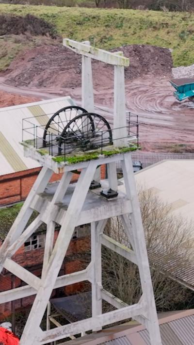 A coal mine headstock viewed from above.