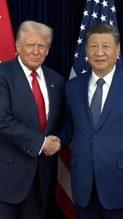 Trump and Xi shake hands