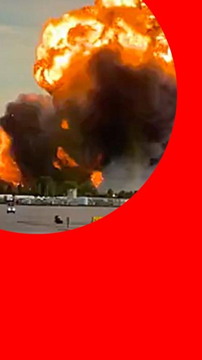 A large fireball with black smoke