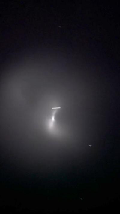 White glowing object in the night sky