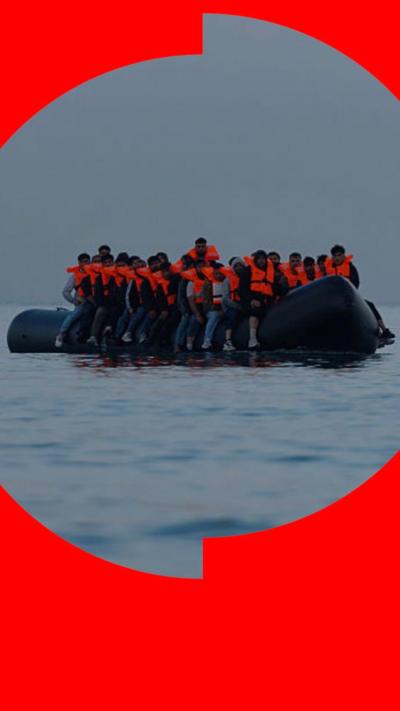 A group of people thought to be migrants aboard a small boat in the English Channel.