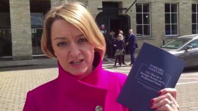 Laura Kuenssberg holds Tory manifesto