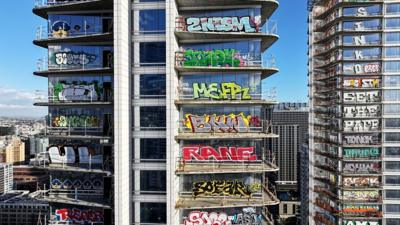 Graffiti spray painted unfinished skyscraper in Los Angeles