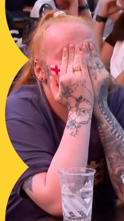 England fans covers her eyes