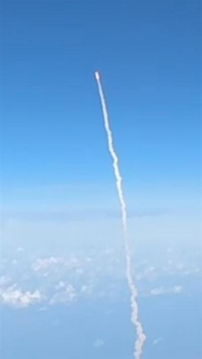 A rocket blasts off.