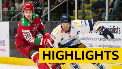 PID Cole Sandford of Cardiff Devils and Coventry Blaze captain Nathanael Halbert battle for the puck