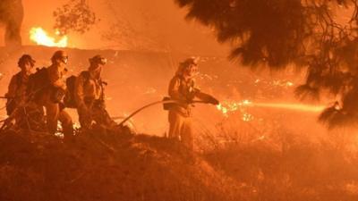 Thousands evacuate West Los Angeles as fire rages near the Getty Museum