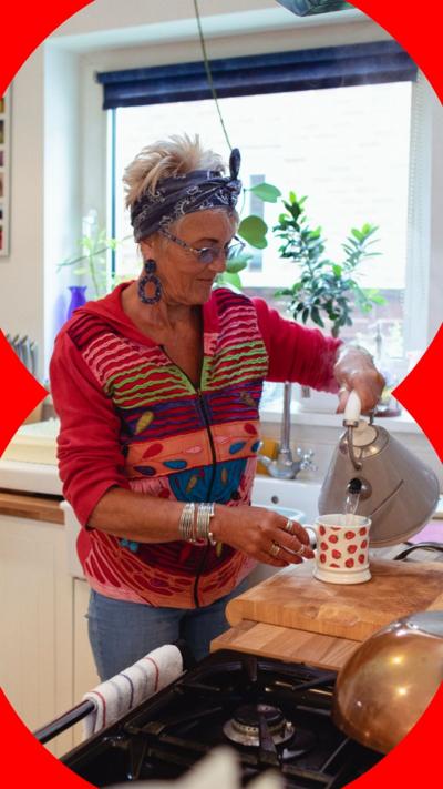 A woman making a cup of tea