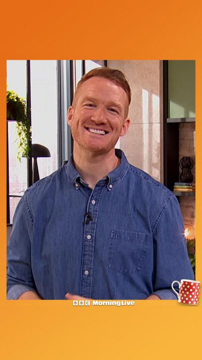 Greg Rutherford smiling at the camera