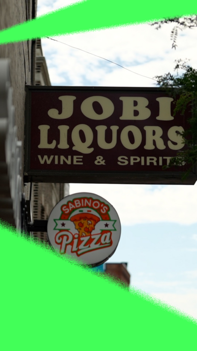 Street sign with Jobi Liquors written on it