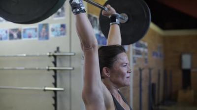 Woman lifting weights