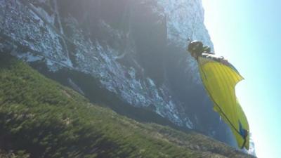 A wingsuit base jumper in Chamonix, France