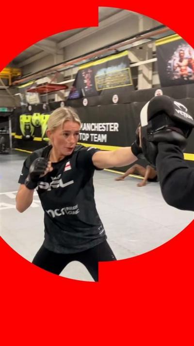 Action shot of Sammy-Jo fighting, with a red templated mask over the image
