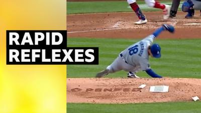 Yoshinobu Yamamoto catches ball travelling at 104mph on the mound for Los Angeles Dodgers