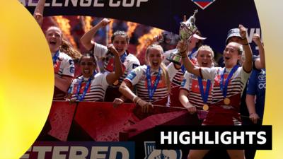 Wigan Warriors celebrate Challenge Cup victory with the trophy