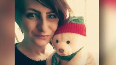 Djuldina Kurtovic with teddy bear