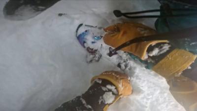 Man caught in a ski well