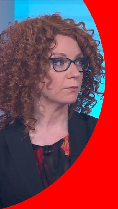A woman 'Kate Elysia' in the Newsnight studio