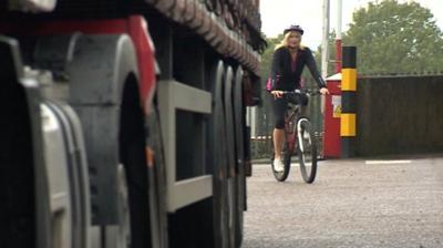 Cyclist approaching lorry