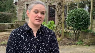 Woman talking in garden