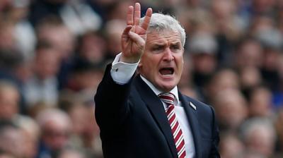 Mark Hughes of Stoke gestures