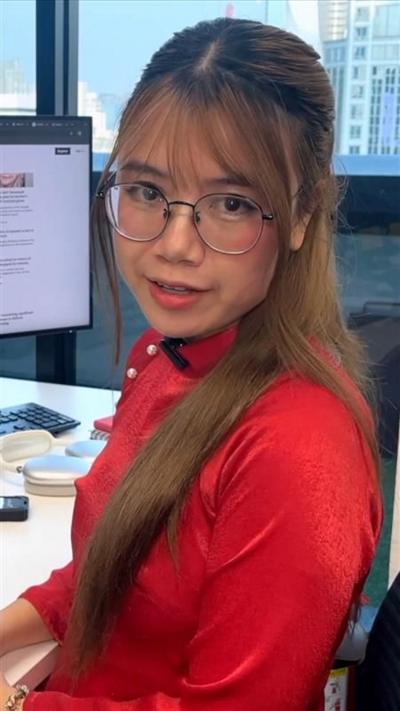 BBC staffer sitting at computer