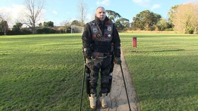 Chris Baker's robotic skeleton helps him walk