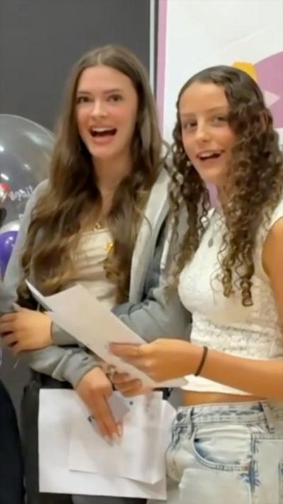 two girls looking happy