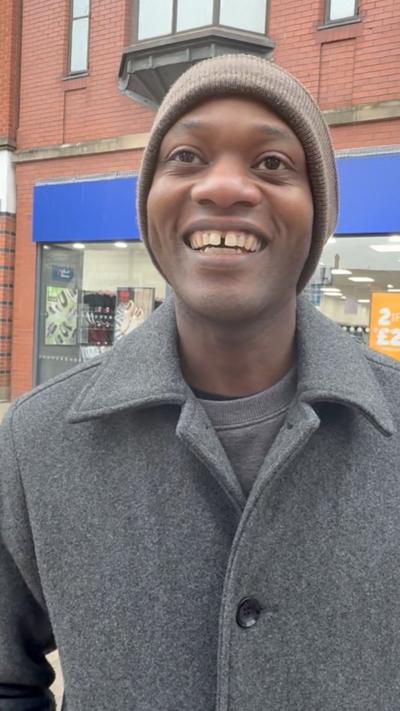 A potential voter talks politics in Hull city centre.