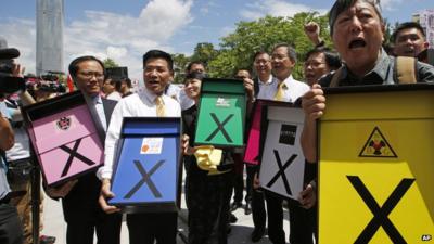 Pro-democracy lawmakers in Hong Kong protesting outside Legislative Council ahead of controversial vote on political reform