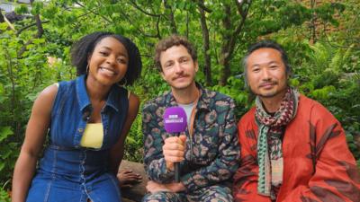 Emma-Louise next to Tom Massey and Je Ahn.