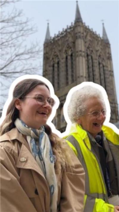 The BBC's Eleanor Maslin with tour guide Dorothy Moss outside Lincoln Cathedral