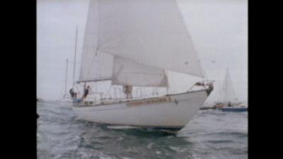 Naomi James' yacht Express Crusader sails into Dartmouth.