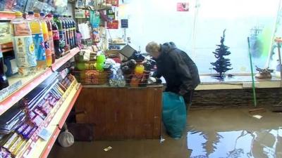 Interior of the flooded Glenridding minimart