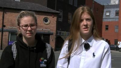 Wrexham students describe hearing a "loud bang" as 22 people are killed and 59 injured in a suicide attack.